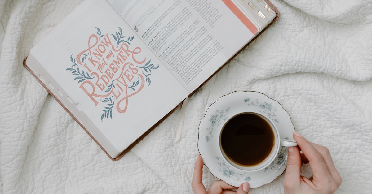 An open Bible with a quote and coffee, embodying a serene morning routine.